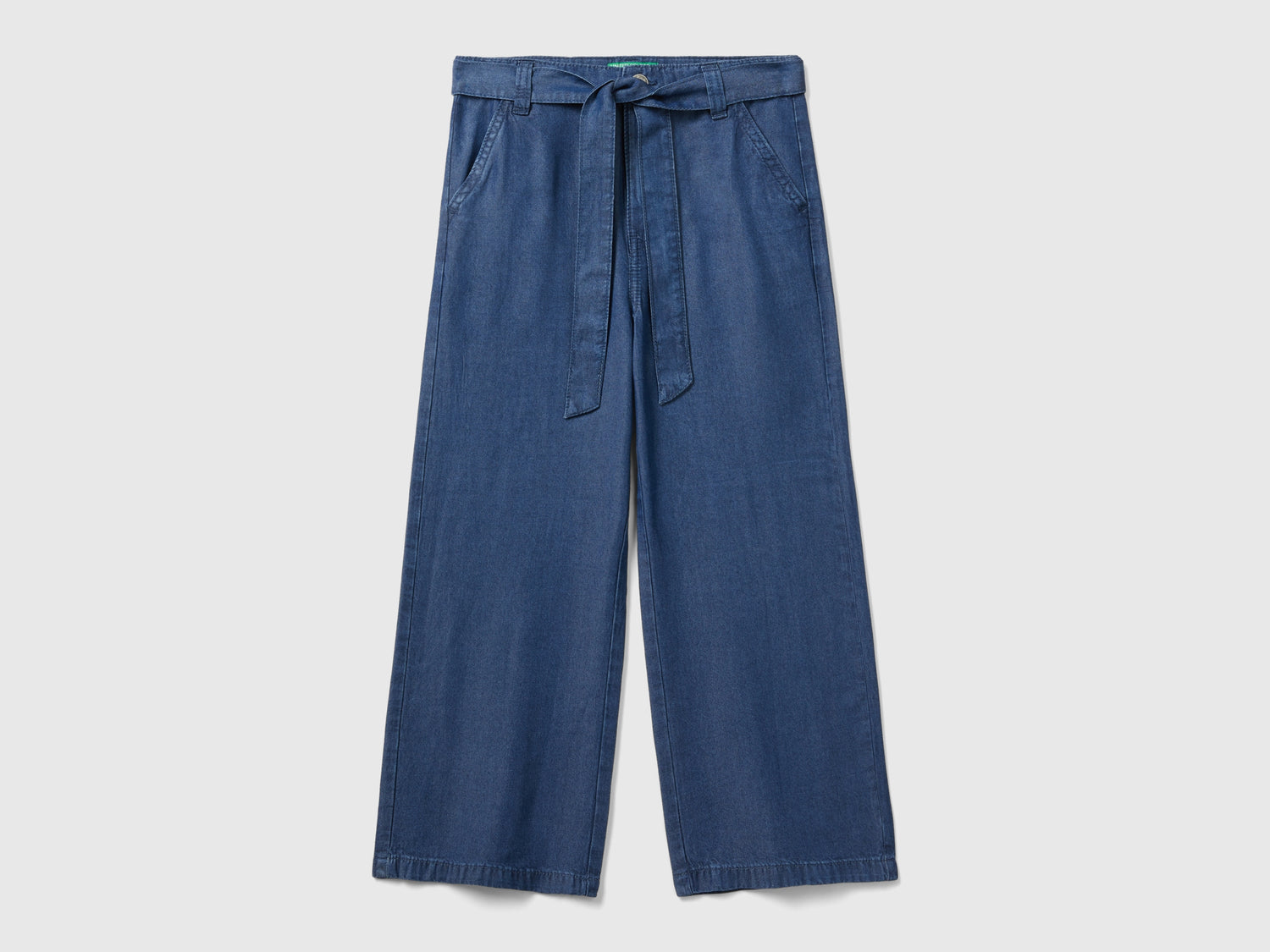 Pantaloni wide fit in chambray da bambina blu | Benetton Outlet