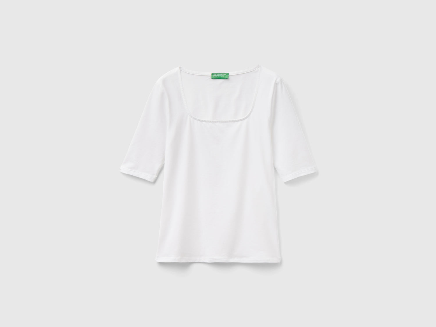 T-shirt aderente in cotone stretch da donna bianco | Benetton Outlet