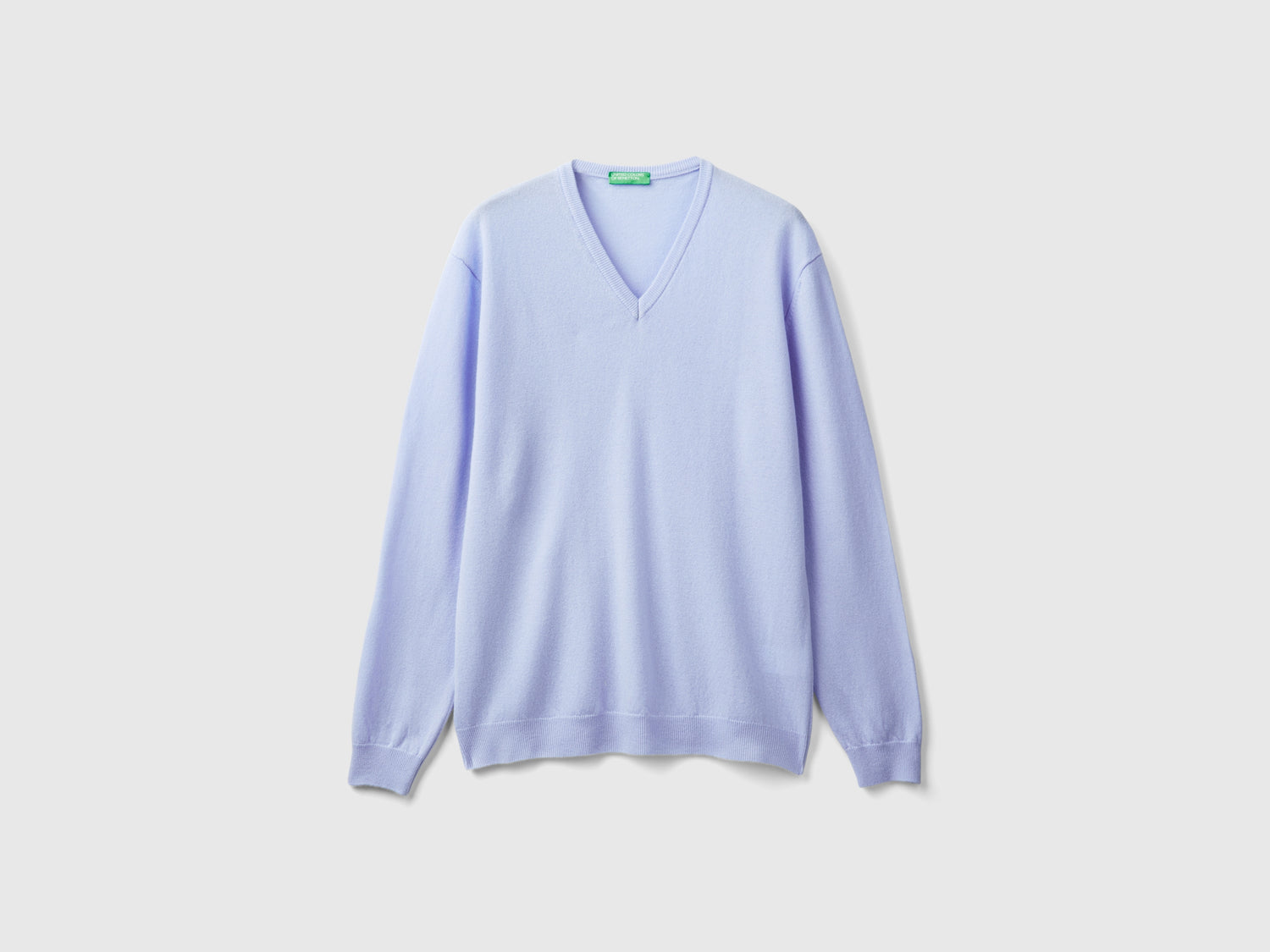 Maglia scollo a V carta da zucchero in pura lana Merino da uomo azzurro | Benetton Outlet