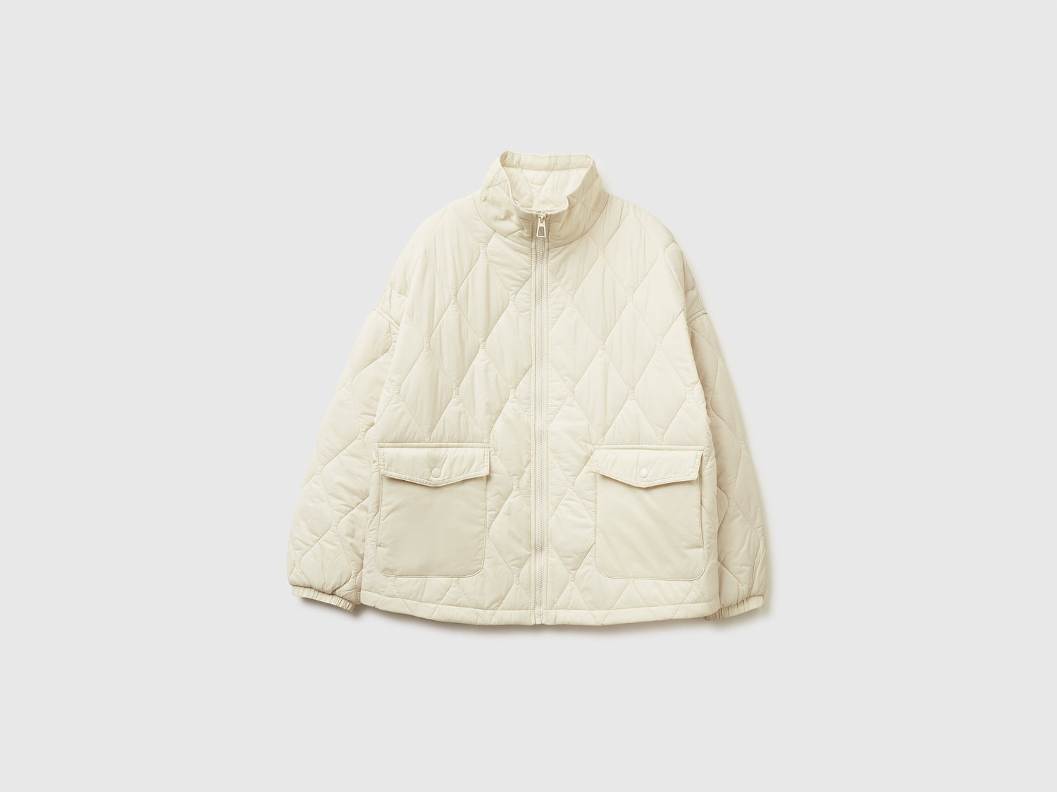 Giubbino trapuntato in nylon da donna bianco panna | Benetton Outlet