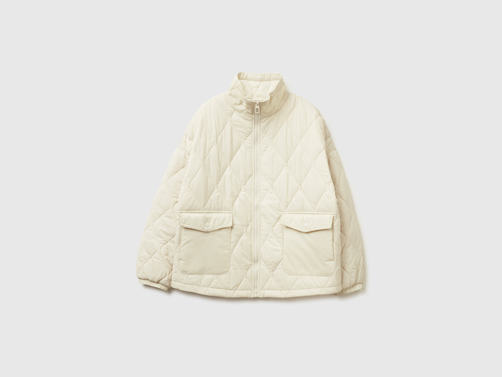 Giubbino trapuntato in nylon da donna bianco panna | Benetton Outlet