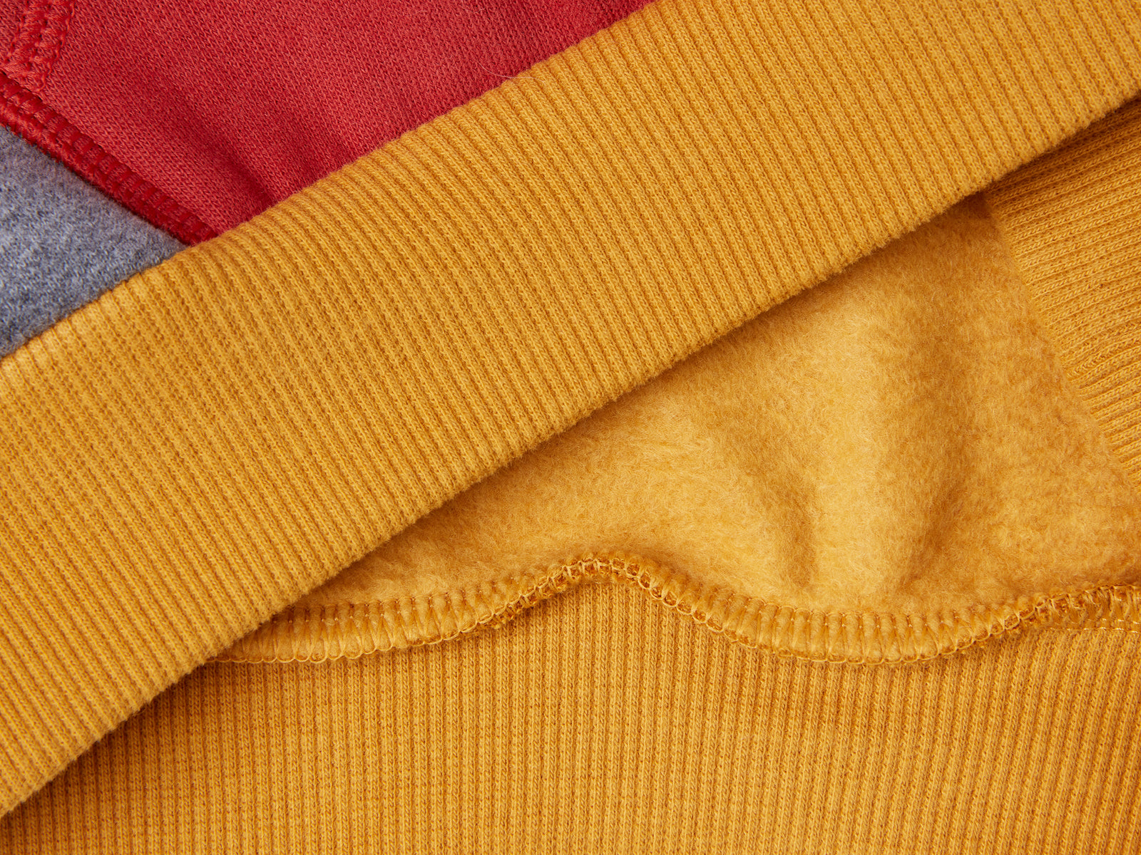 Cálida sudadera con bolsillo canguro da bimbo multi-color 3 | Benetton Outlet