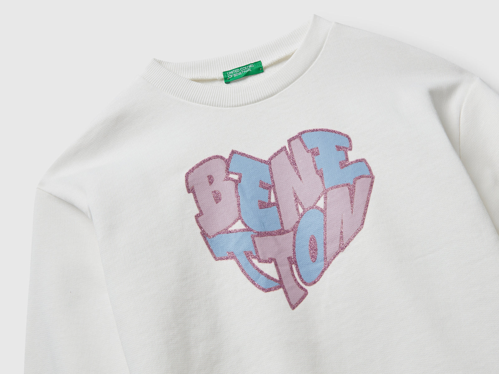 Felpa con stampa logo glitter da bambina bianco panna 3 | Benetton Outlet
