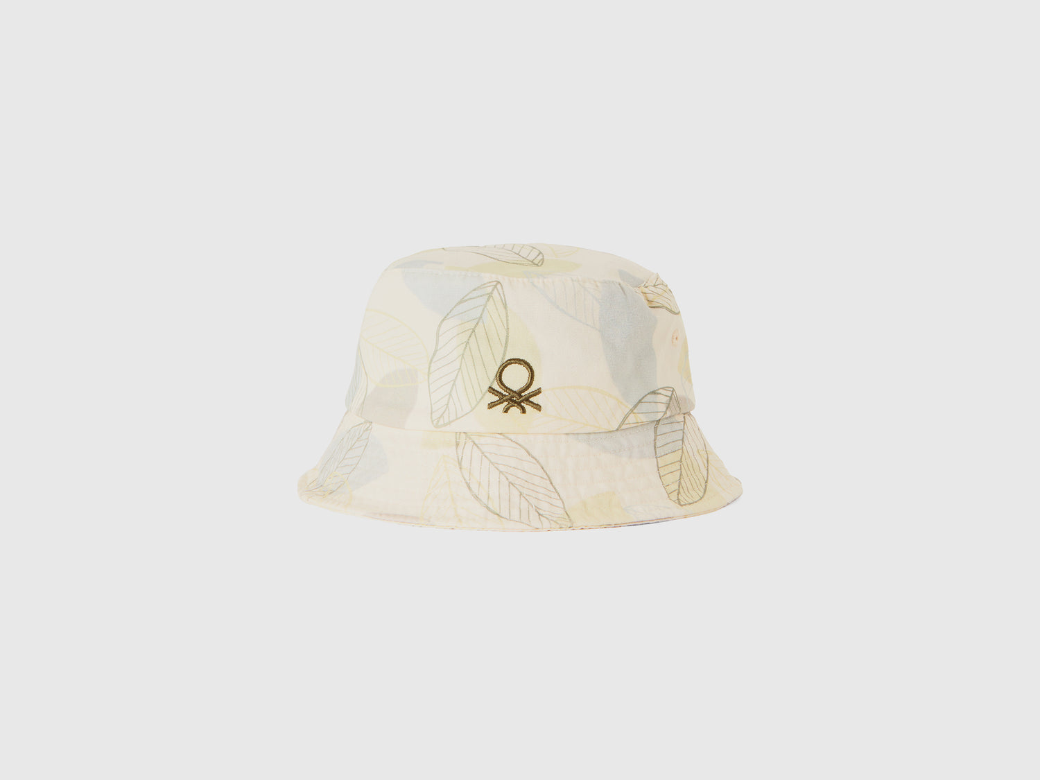 Cappellino alla pescatora con stampa foglie da bambino bianco panna | Benetton Outlet