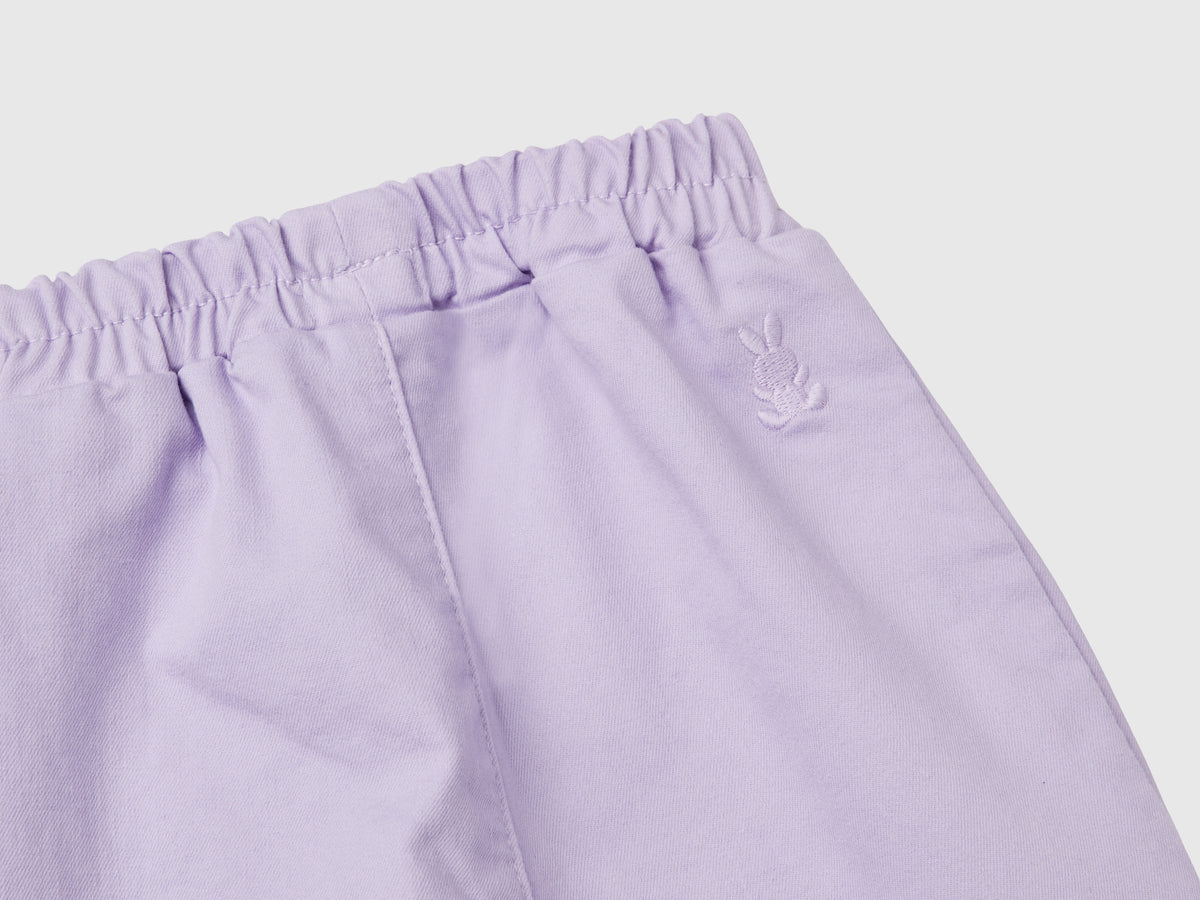 Pantaloni stretch con coulisse