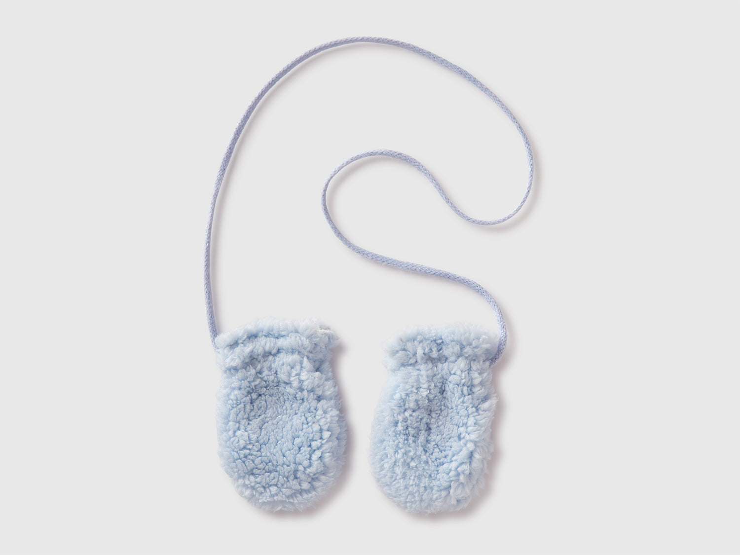Muffole effetto orsetto da neonato celeste | Benetton Outlet