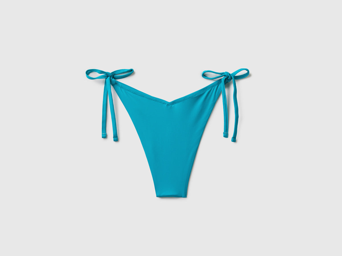 Slip mare elasticizzati con taglio a V e laccetti da annodare sui fianchi