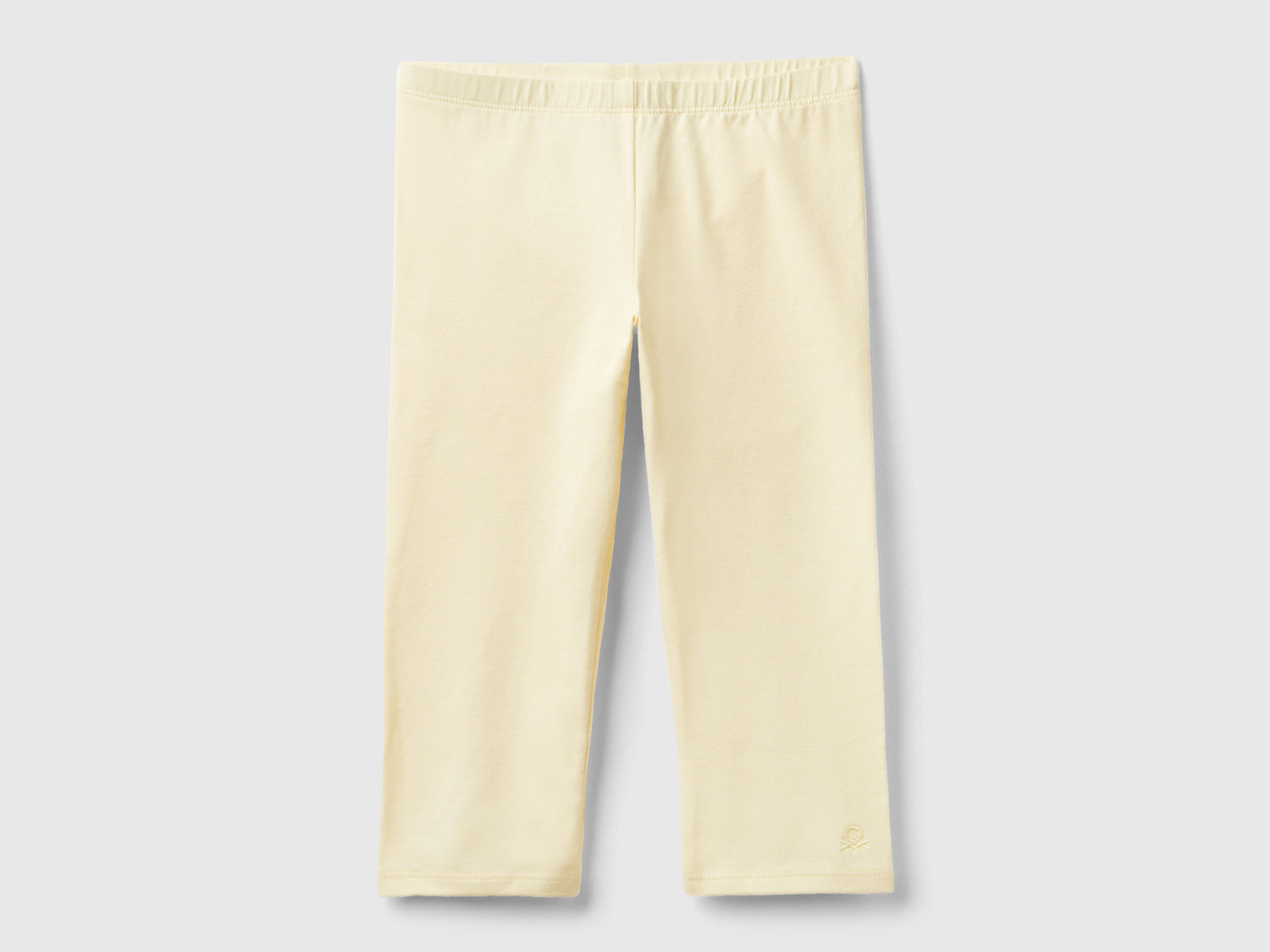 Leggings al ginocchio da bambina giallo | Benetton Outlet