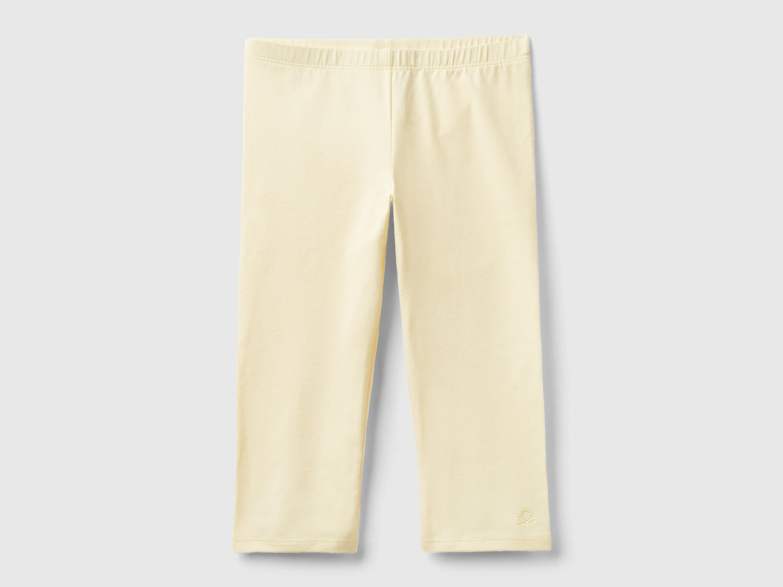 Leggings al ginocchio da bambina giallo | Benetton Outlet