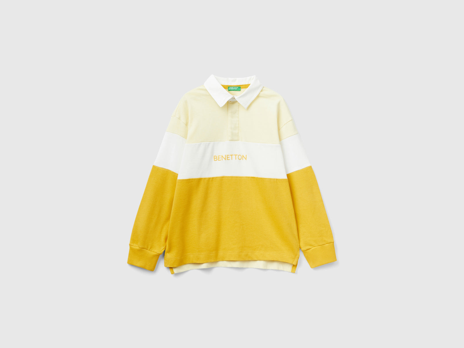 Polo regular fit da bambino giallo | Benetton Outlet