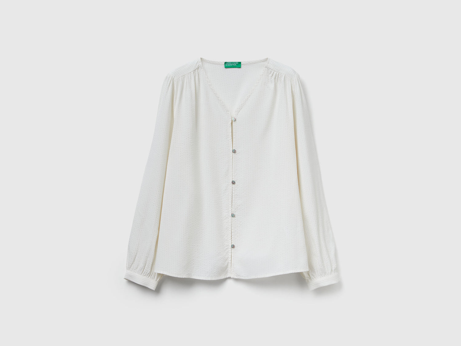 Camicia a righe con scollo a V da donna bianco panna | Benetton Outlet