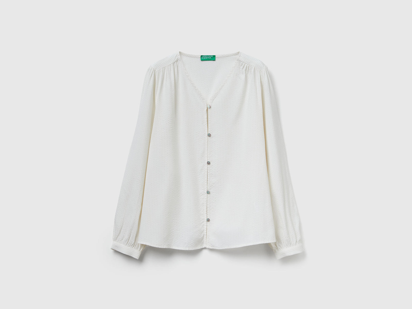 Camicia a righe con scollo a V da donna bianco panna | Benetton Outlet