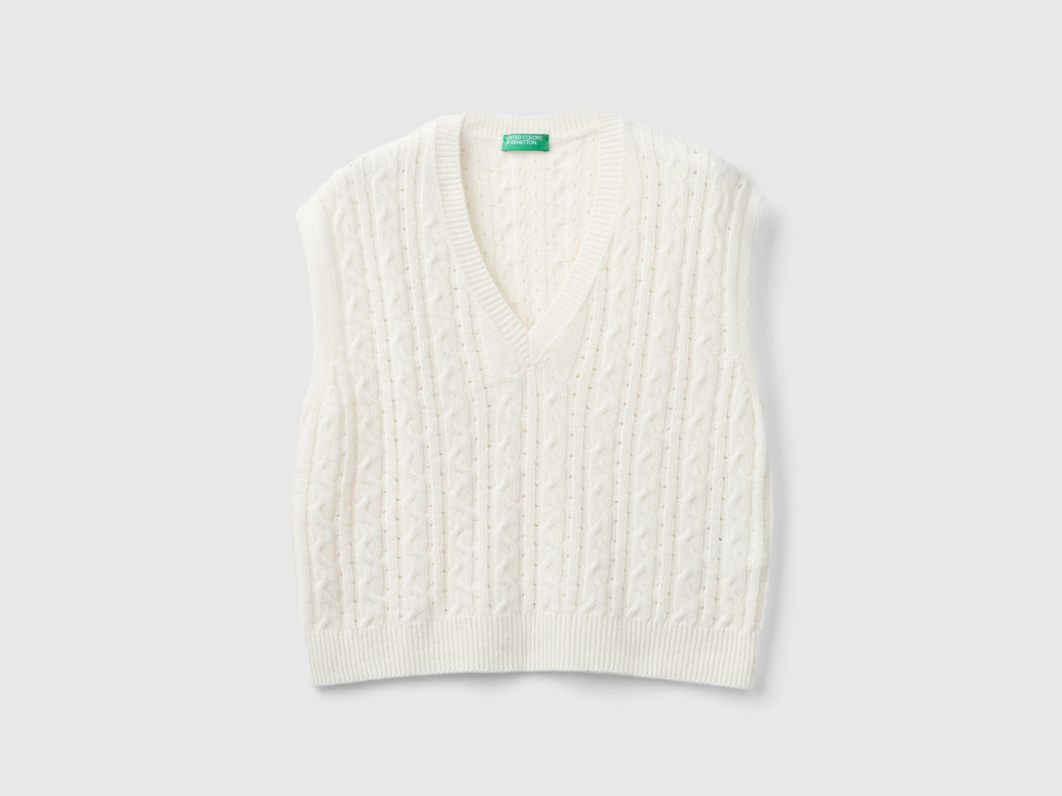 Gilet boxy fit con trecce e trafori da donna bianco panna | Benetton Outlet