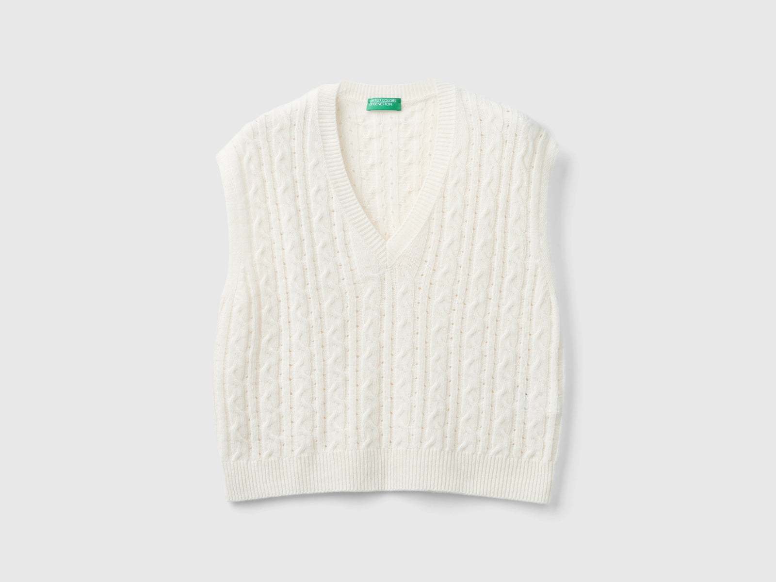 Boxy fit vest with braids and perforations da donna bianco panna | Benetton Outlet