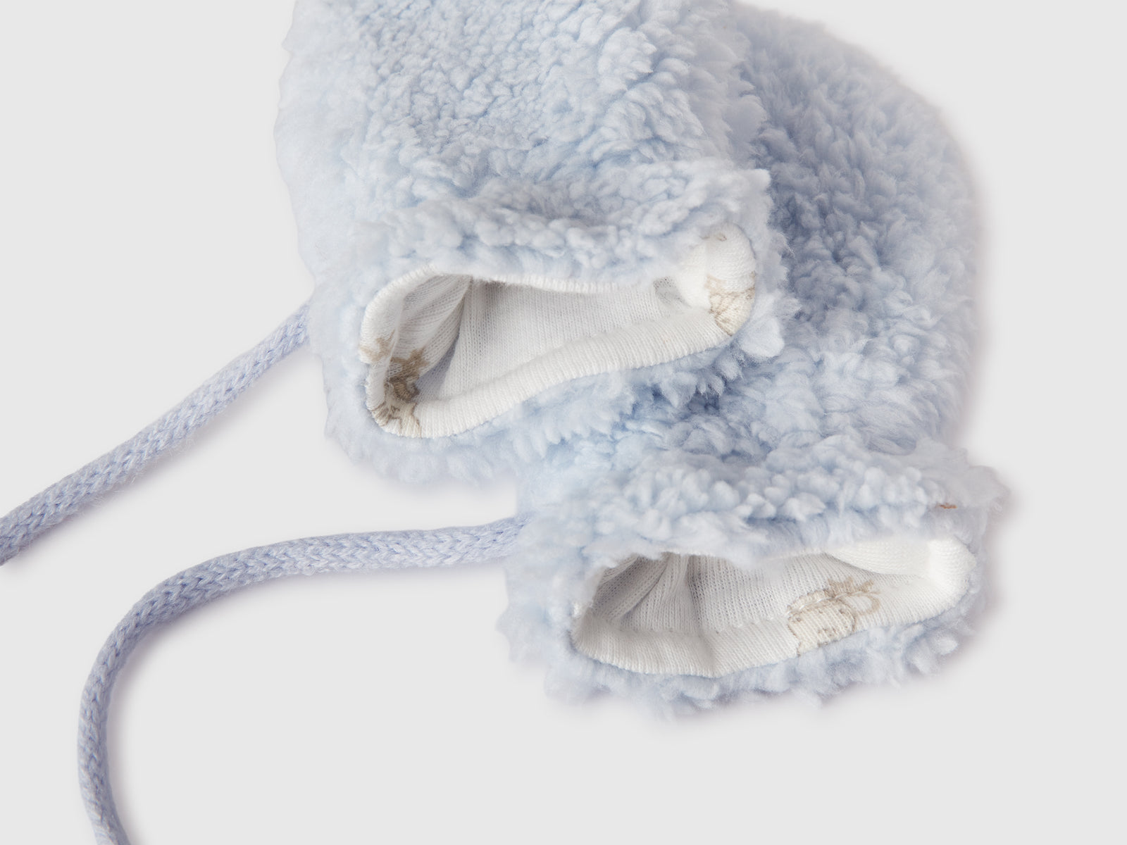 Muffole effetto orsetto da neonato celeste 2 | Benetton Outlet