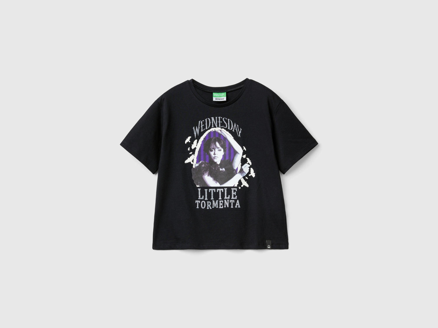 T-shirt Mercoledì Addams da bambina nero | Benetton Outlet