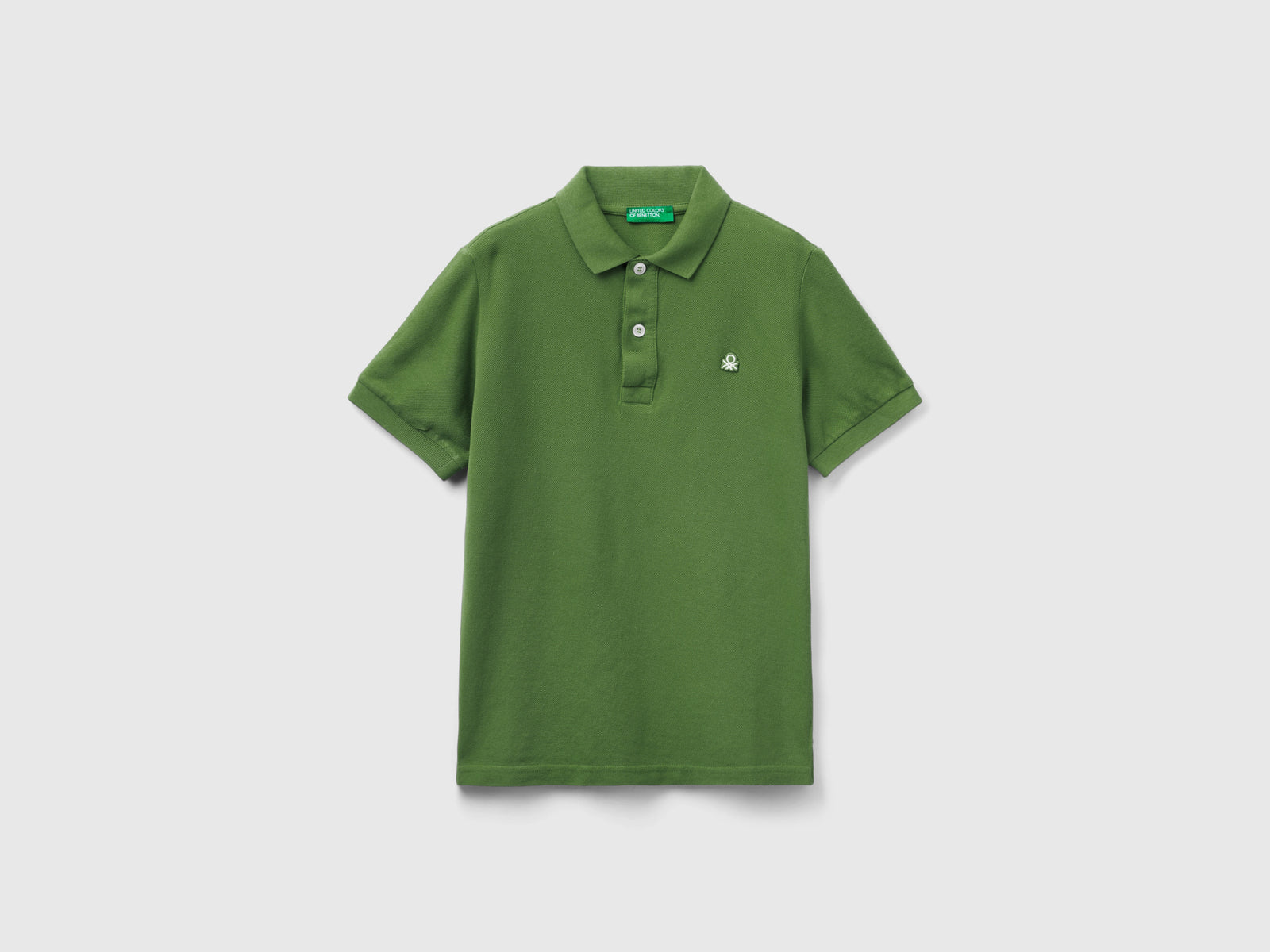 Polo slim fit 100% cotone da bambino verde | Benetton Outlet
