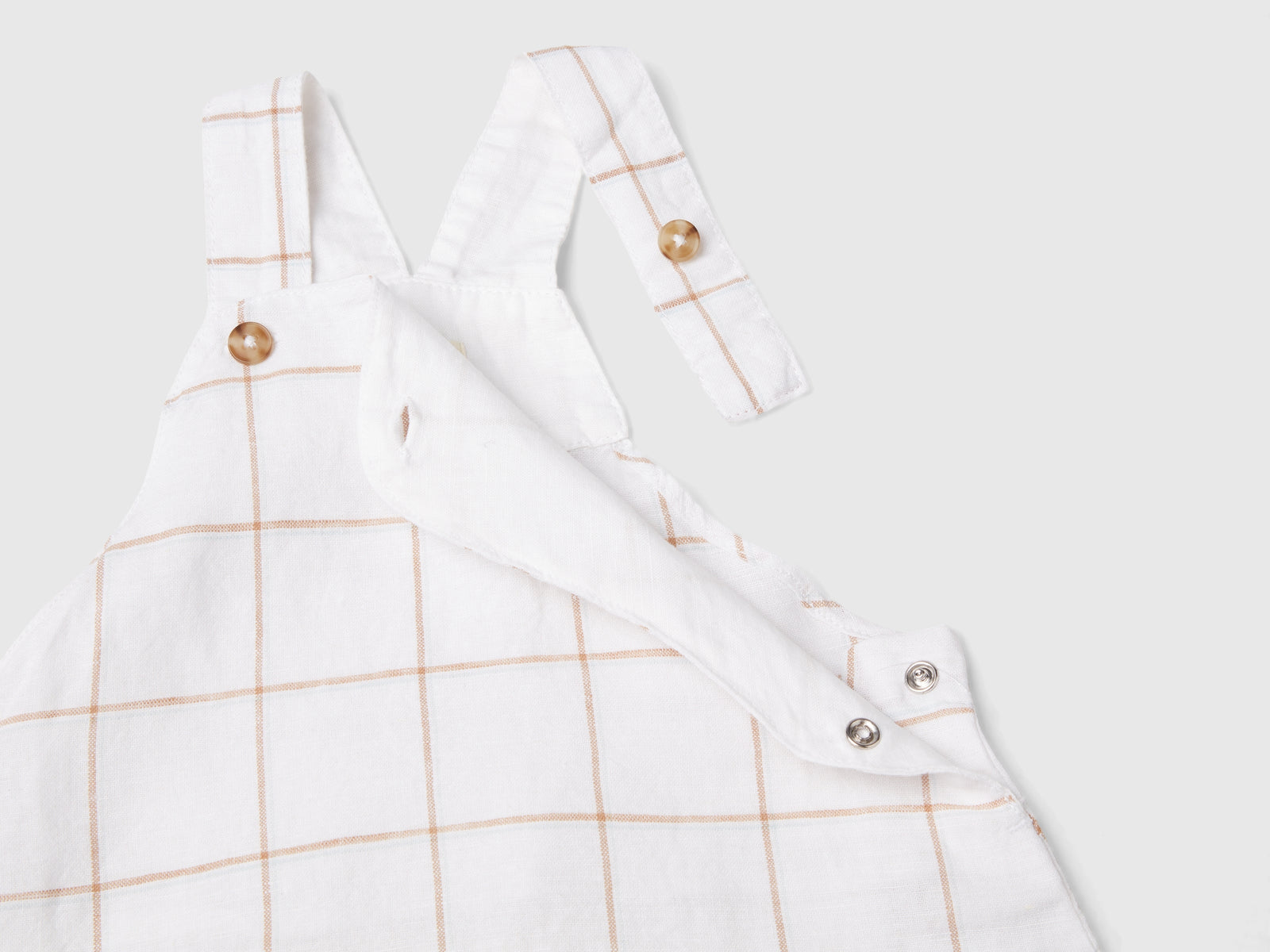 Salopette a quadri in misto lino da neonato bianco 3 | Benetton Outlet