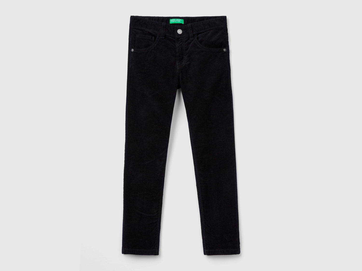 Pantaloni slim fit in velluto stretch da bambino nero | Benetton Outlet