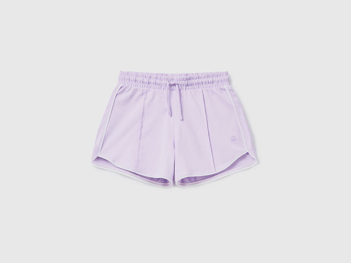 Pantaloni corti in puro cotone con piping a costrasto da bambina lilla | Benetton Outlet