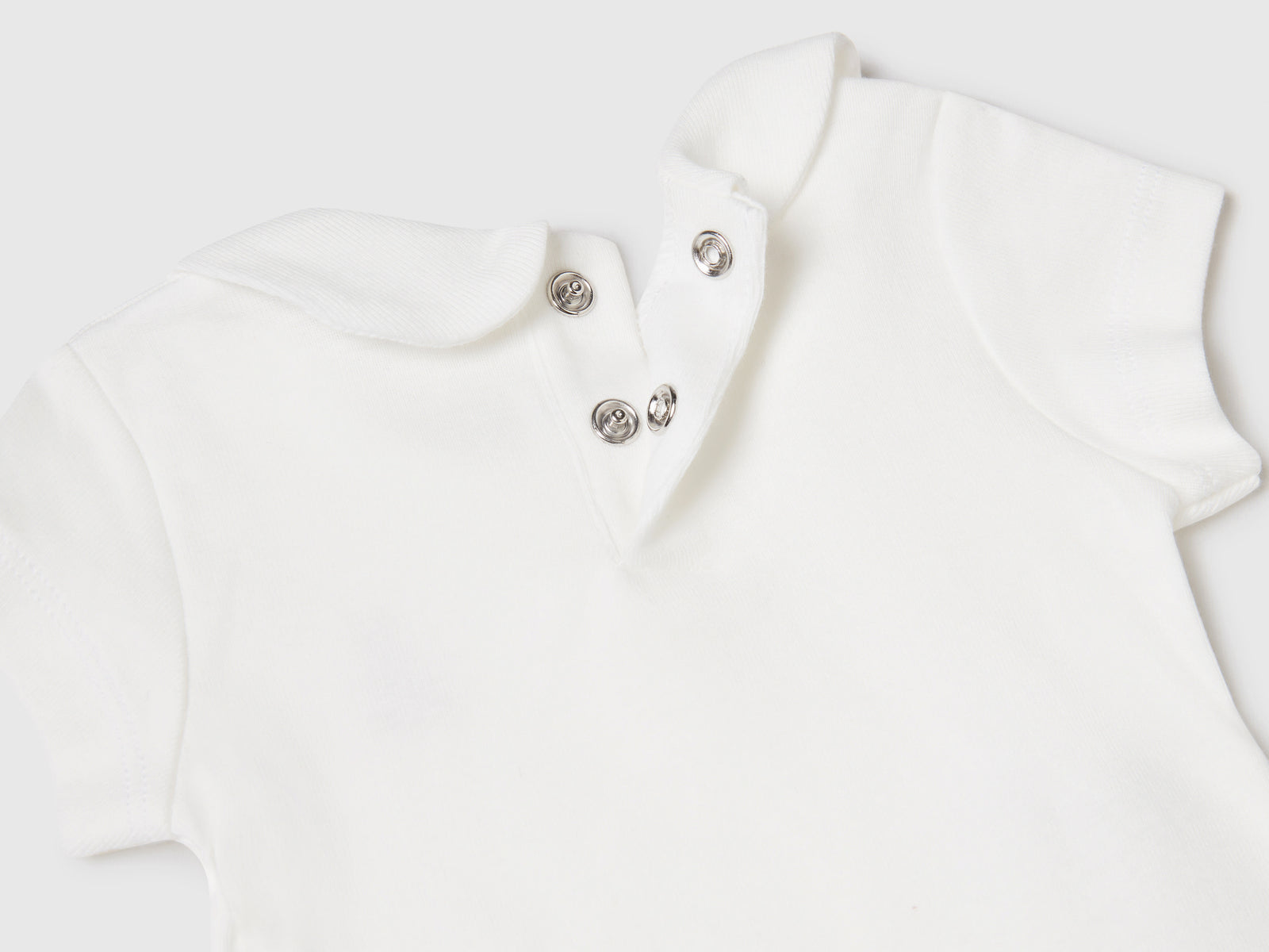 Body con colletto in cotone biologico da neonato bianco panna 2 | Benetton Outlet