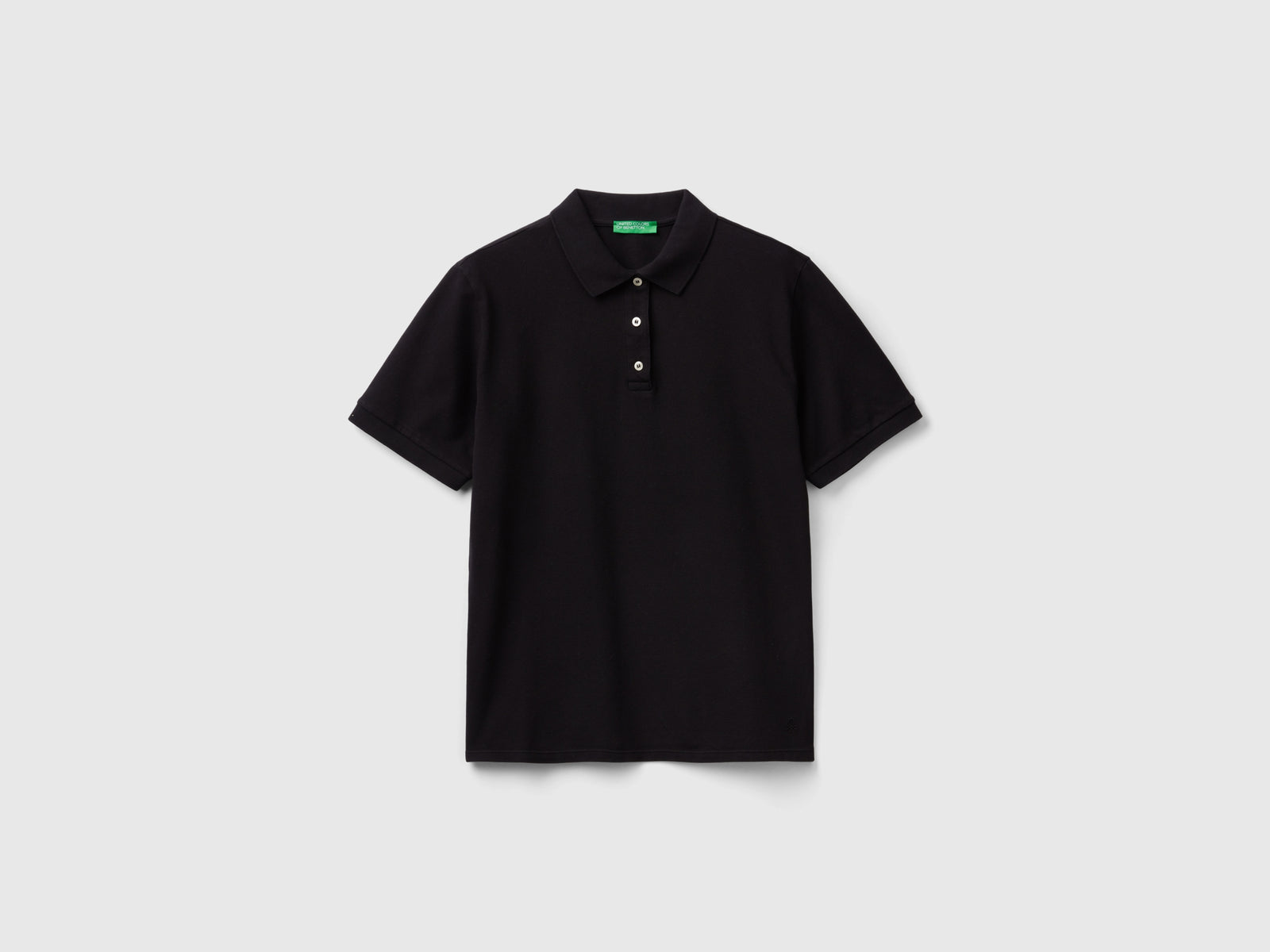 Polo in cotone bio stretch da donna nero | Benetton Outlet