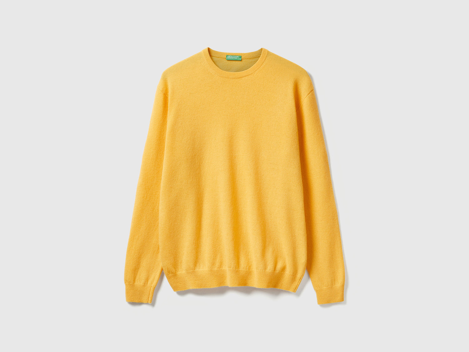 Maglia girocollo giallo in pura lana Merino da uomo senape | Benetton Outlet
