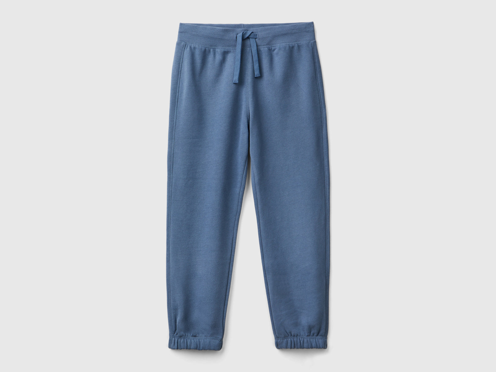 Joggers in warm fleece da bambino avio | Benetton Outlet