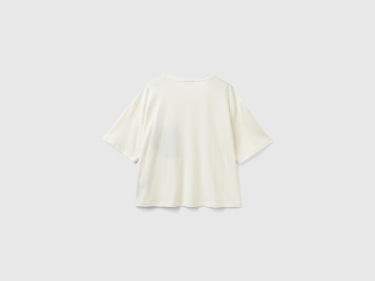 T-shirt boxy fit con fiore