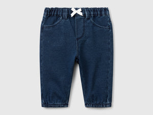 Pantaloni effetto denim con fiocchetto