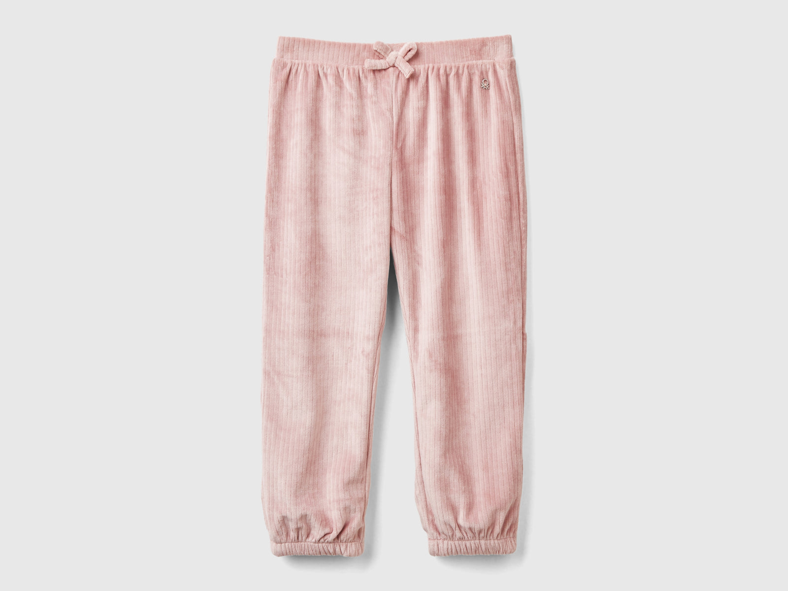 Pantaloni in ciniglia da bimba rosa tenue | Benetton Outlet