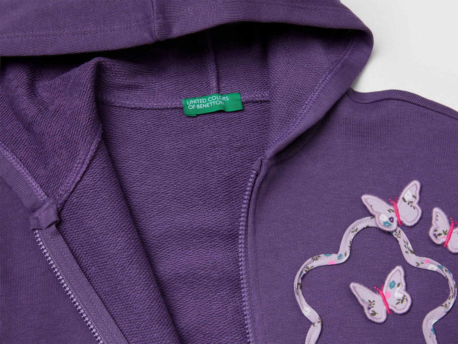 Felpa con cappuccio e paillettes da bimba viola 3 | Benetton Outlet