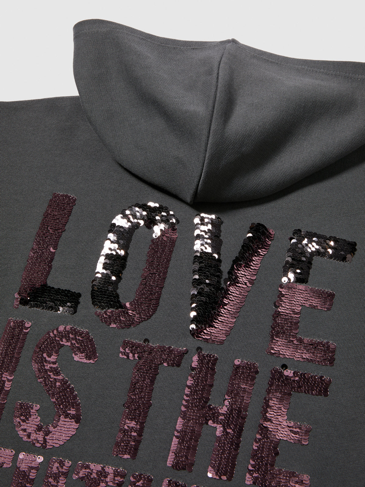 Felpa con paillettes flip up