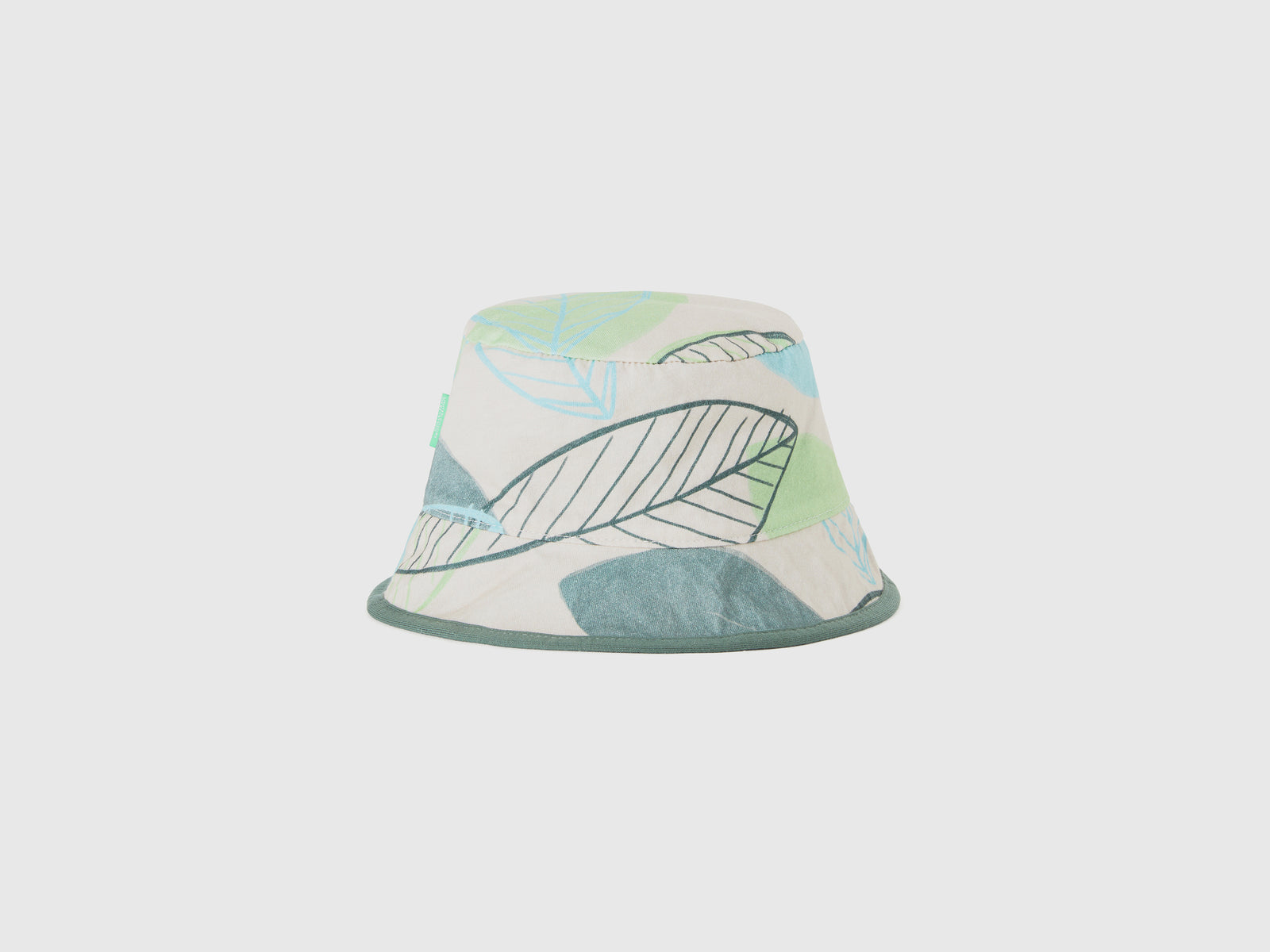 Cappello reversibile con stampa foglie da bimbo verde chiaro 2 | Benetton Outlet