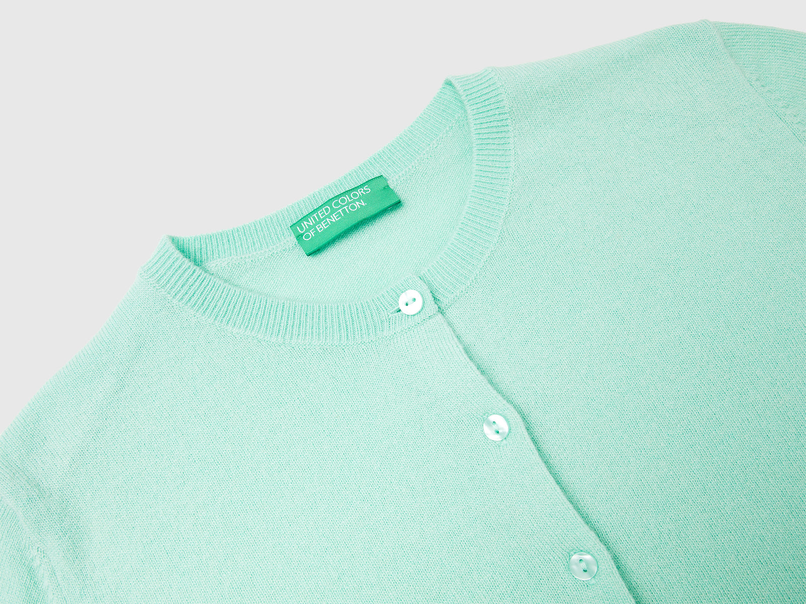 Cardigan girocollo in pura lana Merino da donna verde chiaro 3 | Benetton Outlet