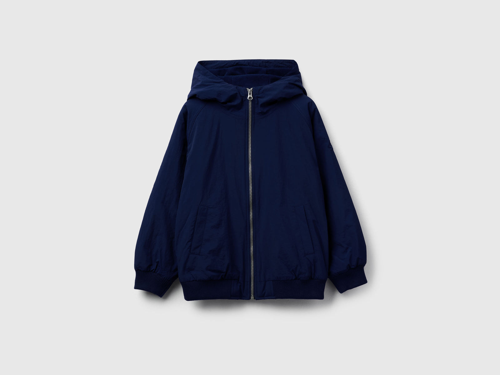 Giubbino in nylon con cappuccio da bambino blu scuro | Benetton Outlet