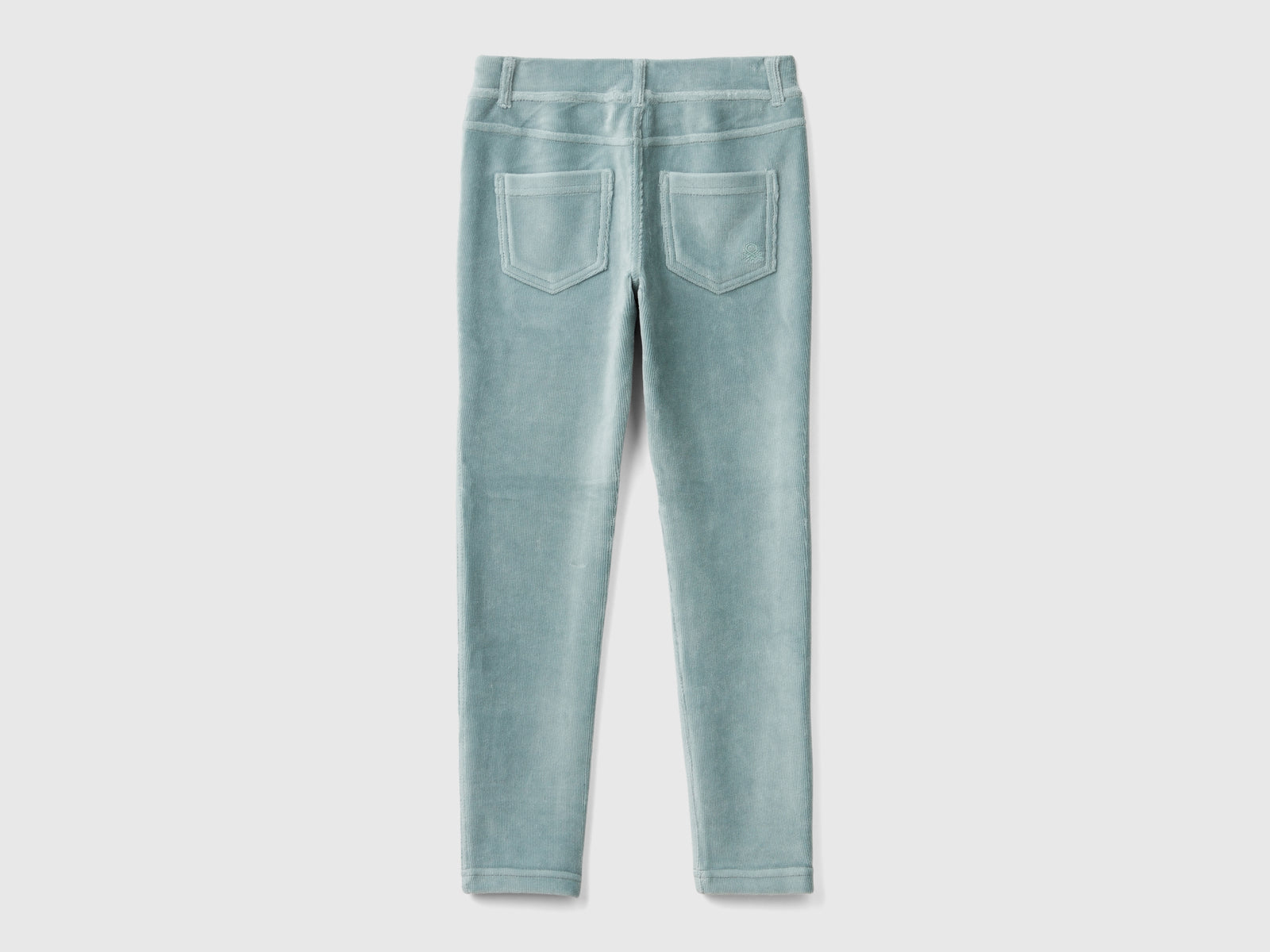 Pantaloni super skinny in ciniglia da bambina grigio perla 2 | Benetton Outlet
