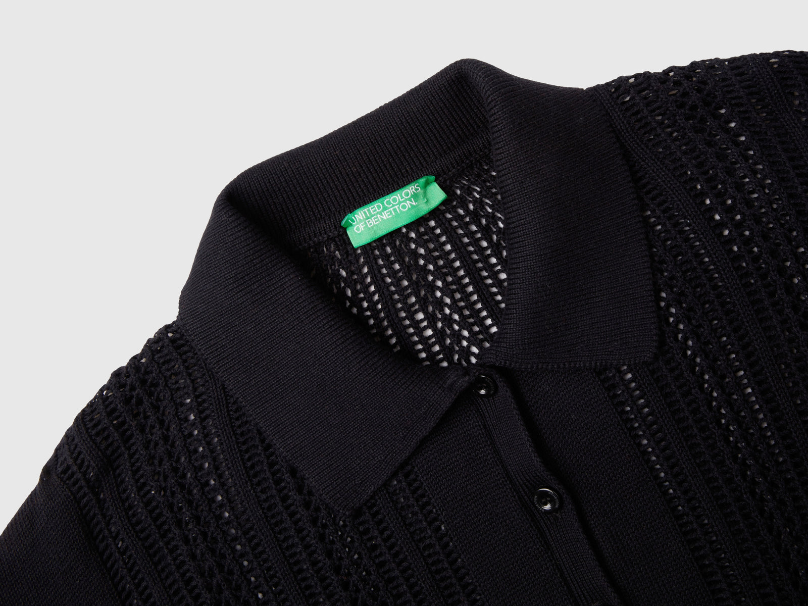 Polo in maglia crochet da donna nero 3 | Benetton Outlet