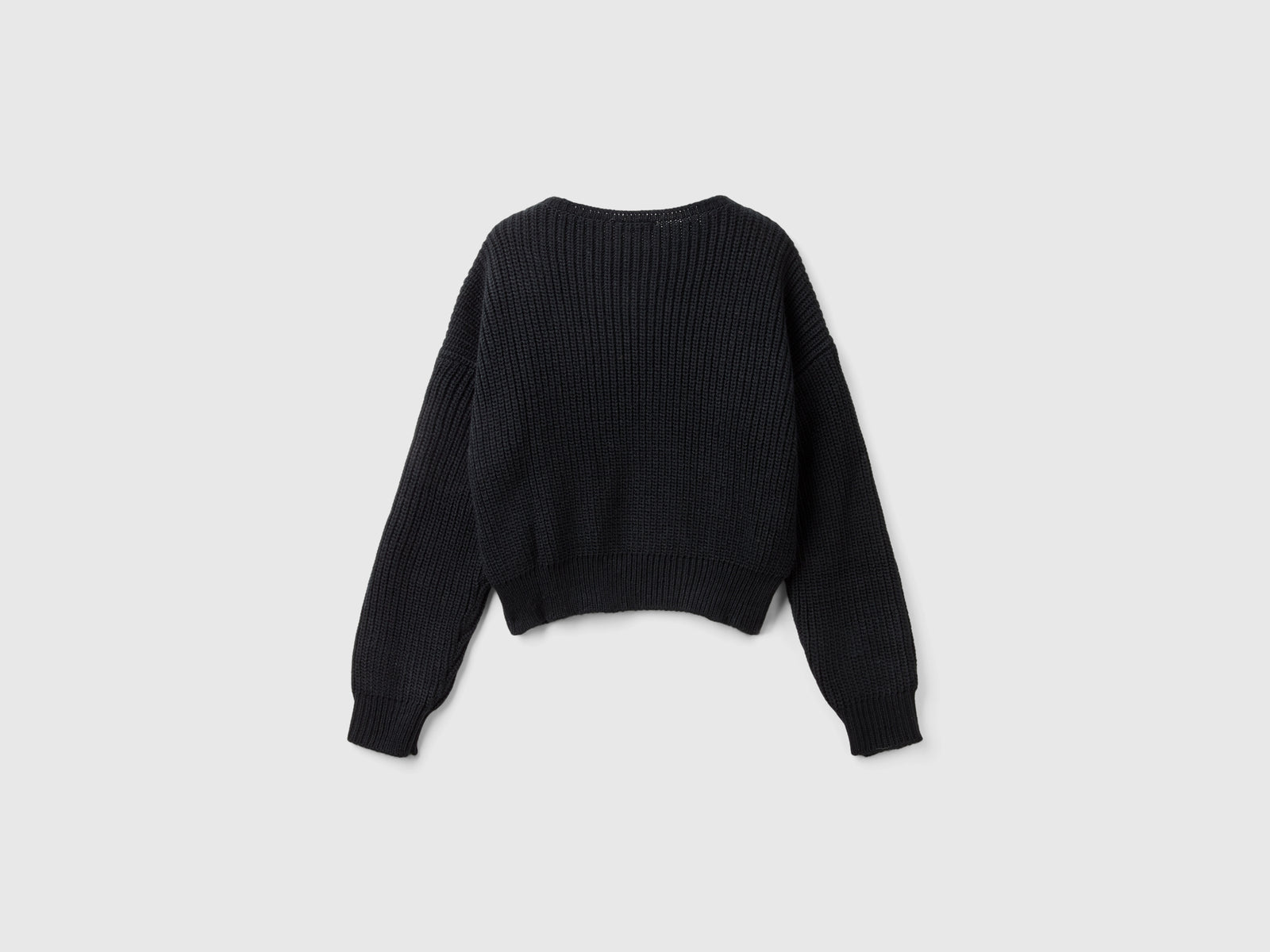 Maglia boxy fit da bambina nero 2 | Benetton Outlet