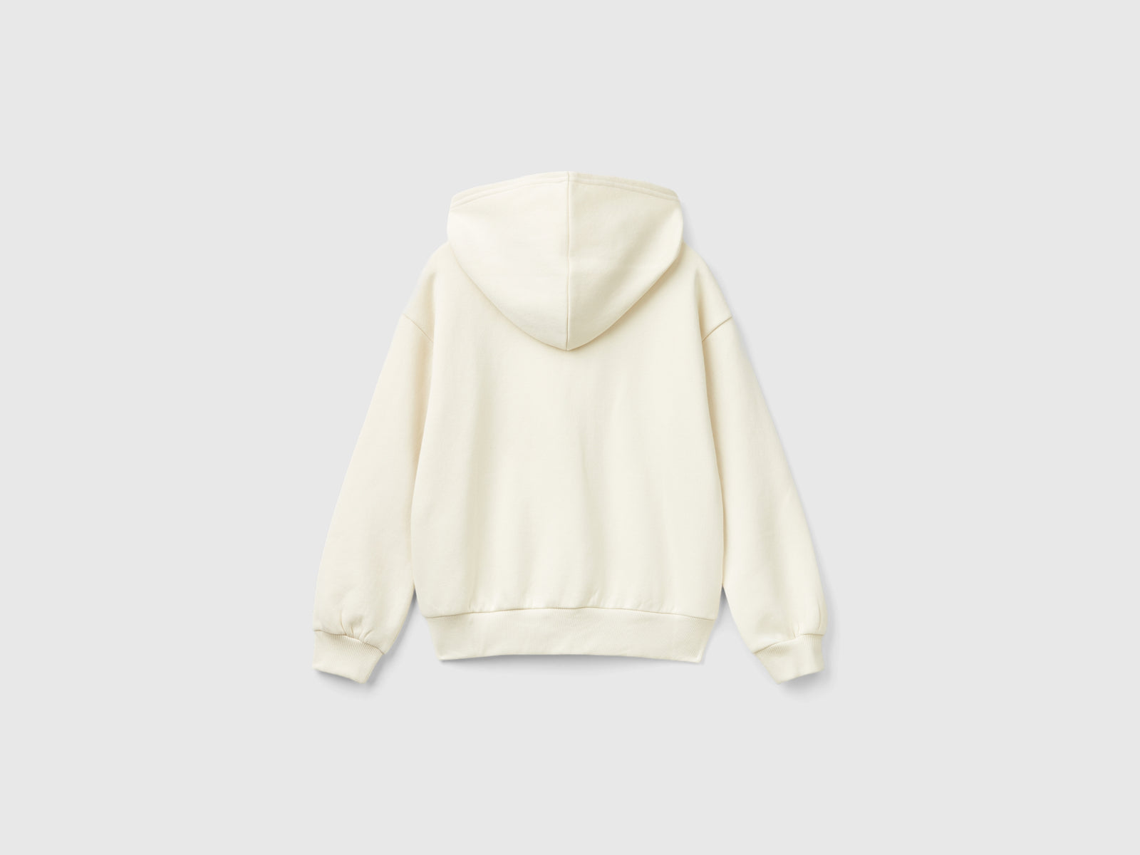 Felpa con zip e paillettes da bambina bianco panna 2 | Benetton Outlet