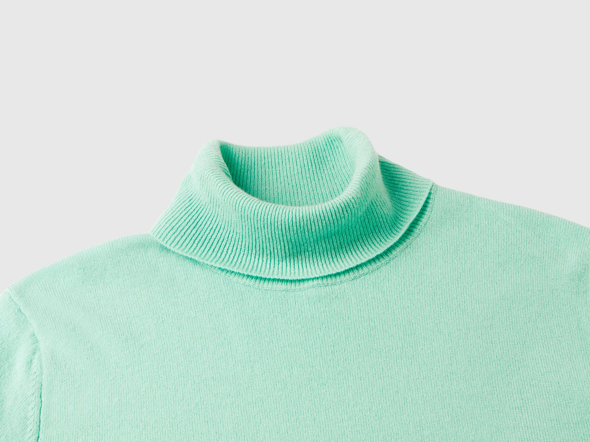 Maglione dolcevita chiaro in pura lana Merino