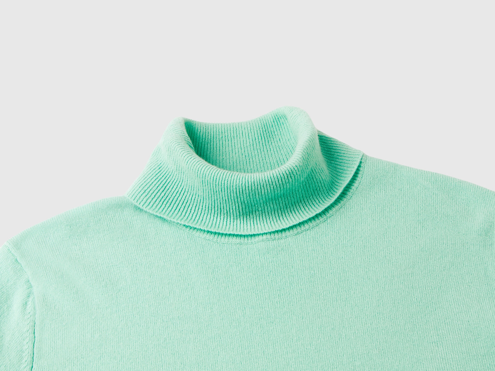 Maglione dolcevita chiaro in pura lana Merino da donna verde acqua 3 | Benetton Outlet