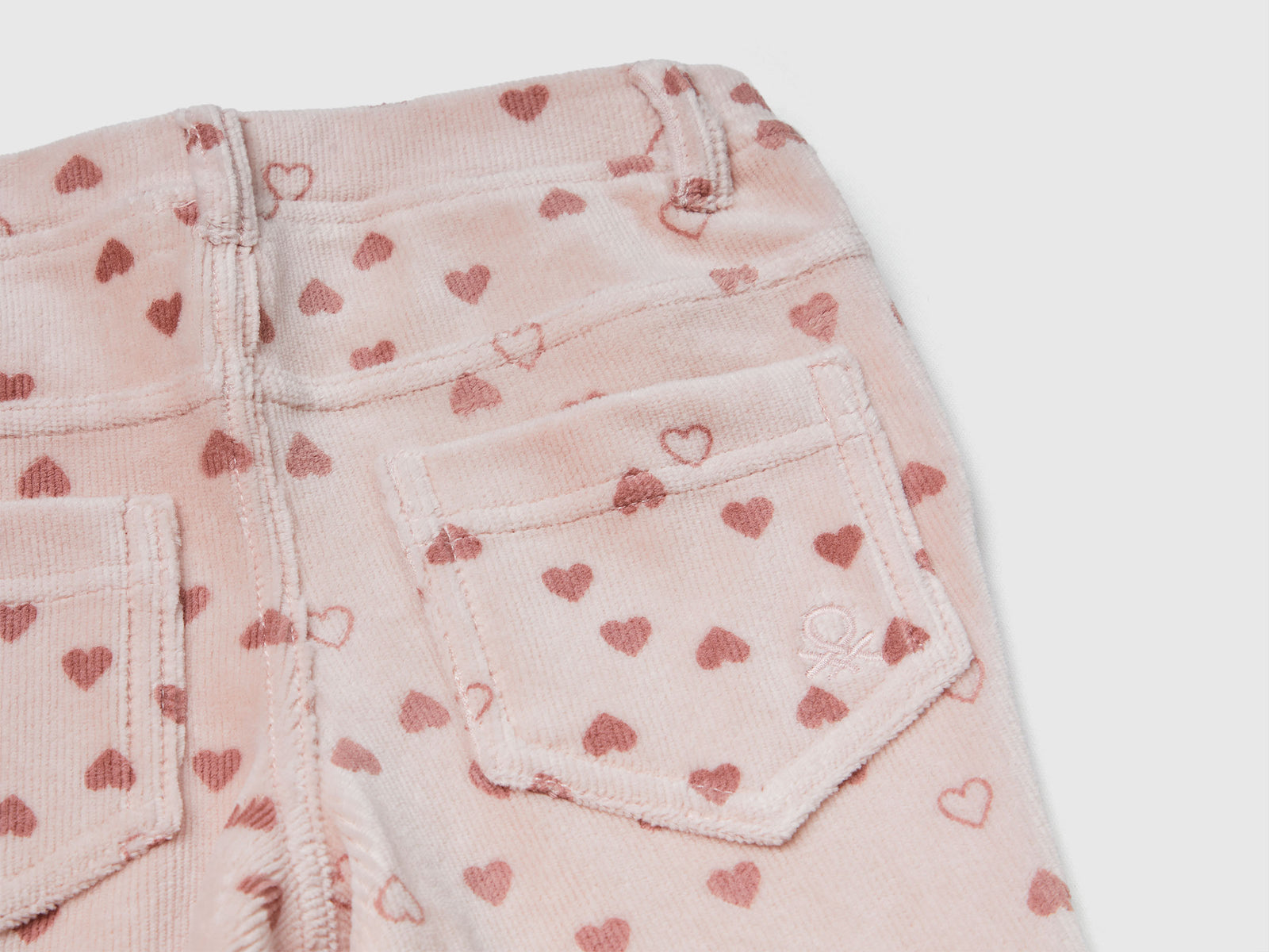 Pantaloni slim fit in ciniglia da bimba rosa 3 | Benetton Outlet