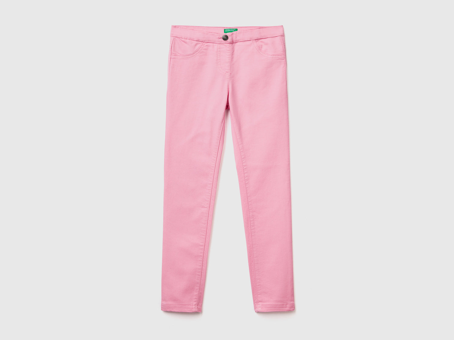 Pantaloni lunghi in misto cotone elasticizzato effetto denim da bambina rosa | Benetton Outlet