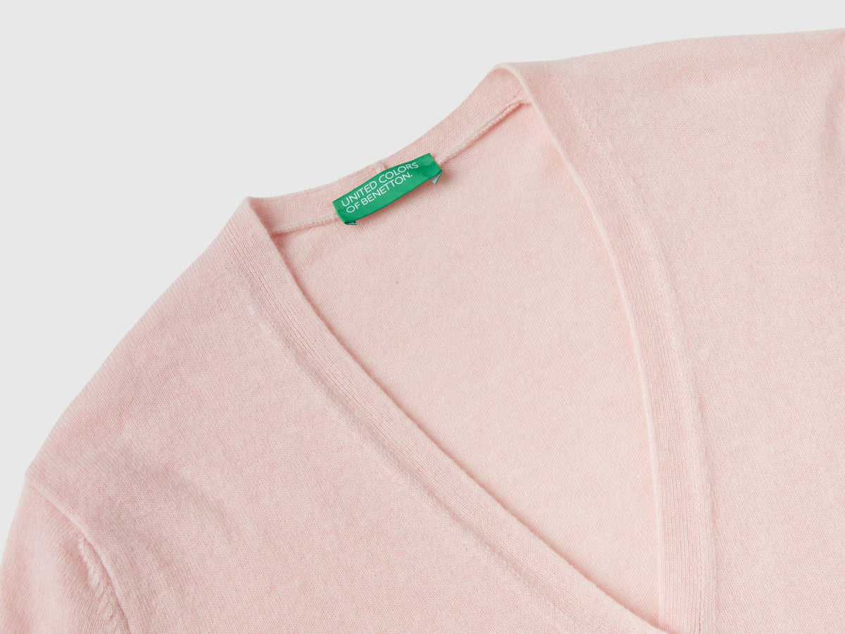 Cardigan scollo a V in pura lana Merino