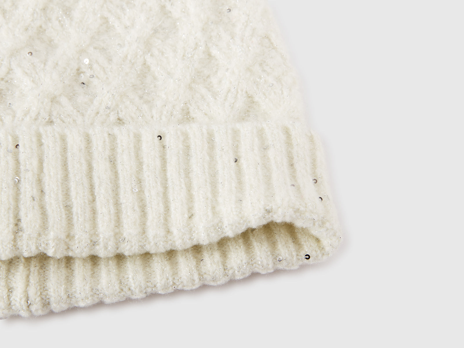 Cappello con lurex da bambina bianco panna 3 | Benetton Outlet
