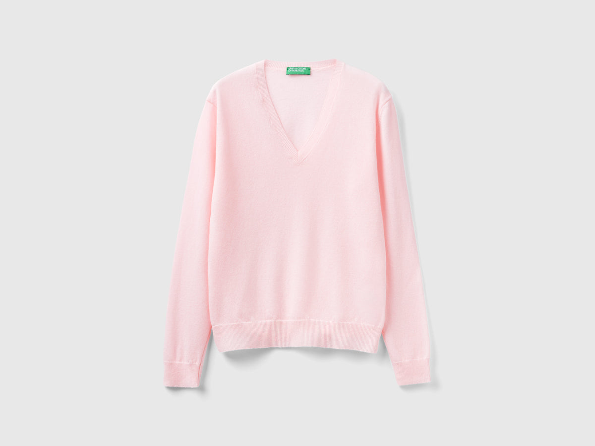 Maglia con scollo a V rosa chiaro in pura lana Merino