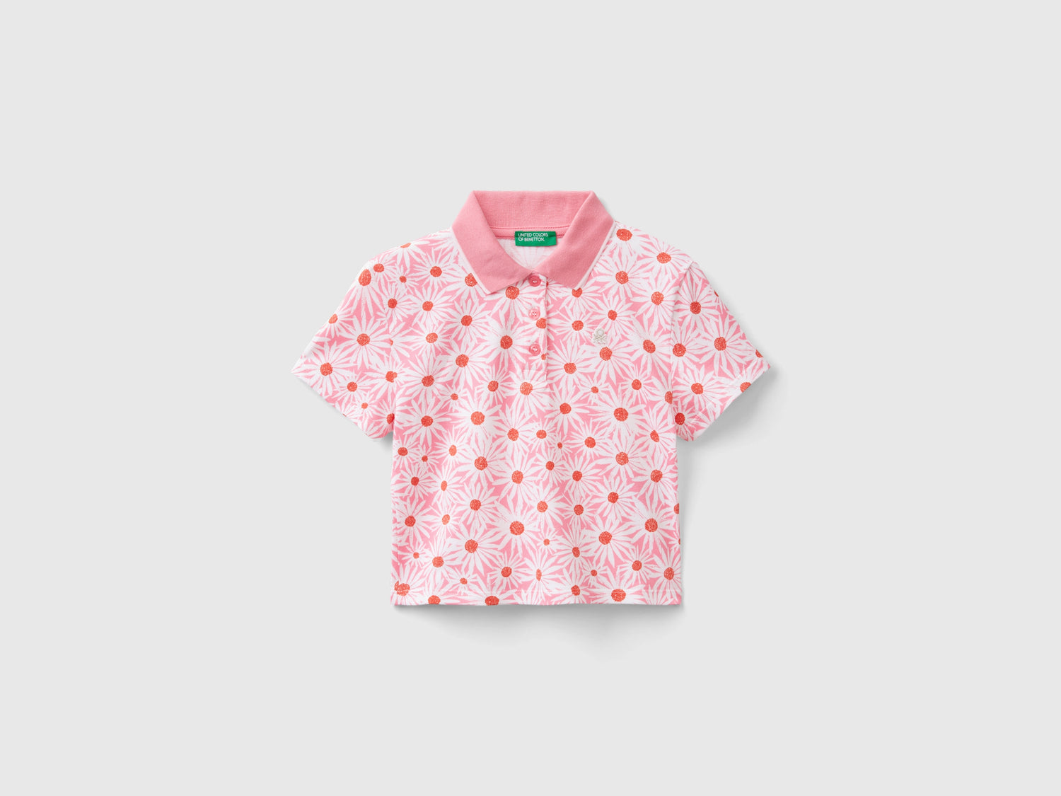 Polo con stampa fiori da bambina rosa | Benetton Outlet