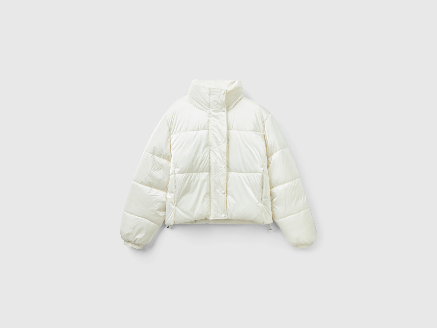 Piumino imbottito in nylon lucido da donna bianco panna | Benetton Outlet
