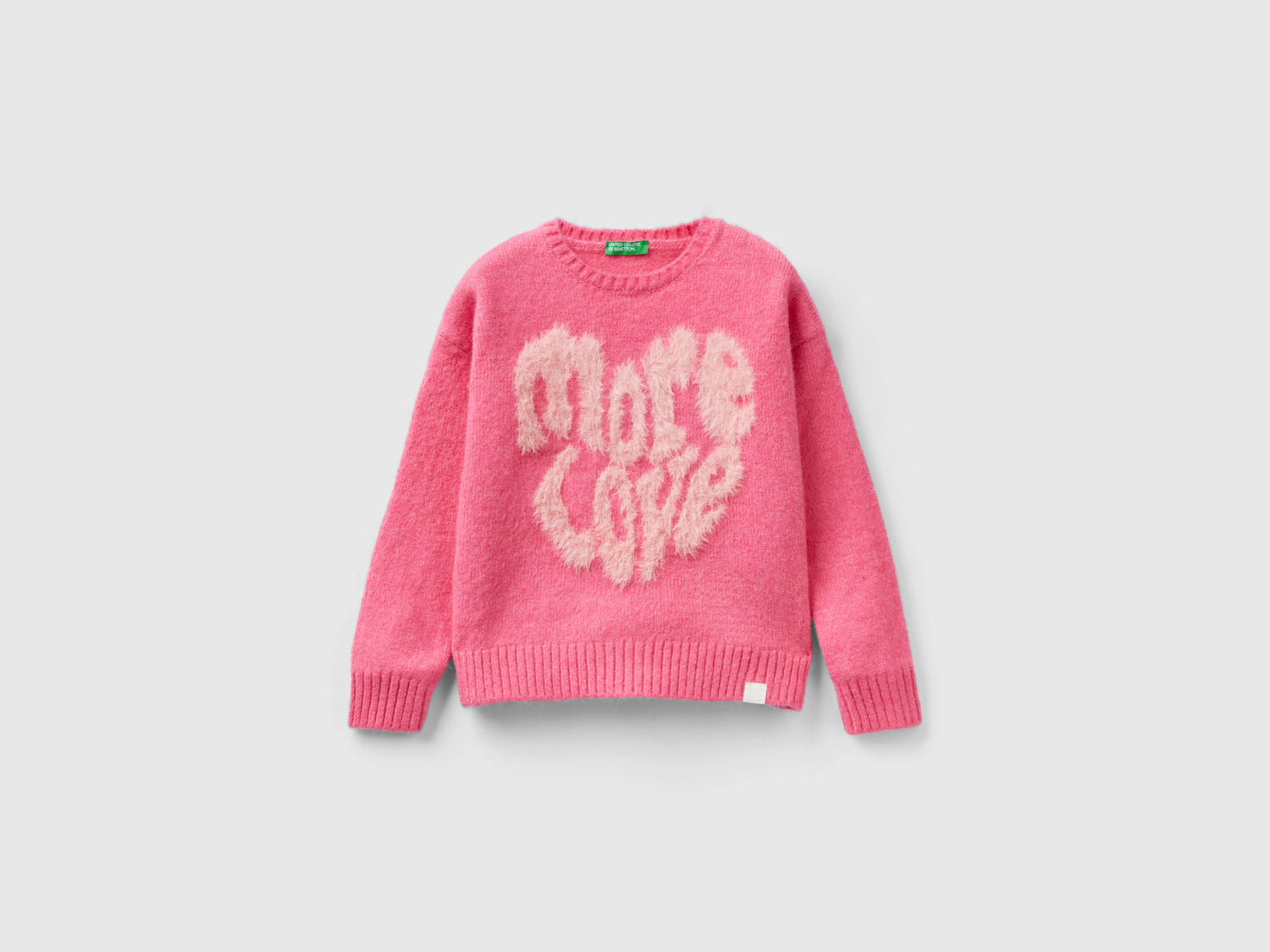 Maglia boxy fit con intarsio da bambina fucsia | Benetton Outlet